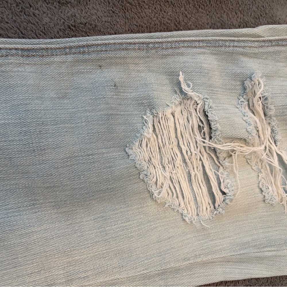 Distressed Light Blue Jeans - Picture 2 of 11